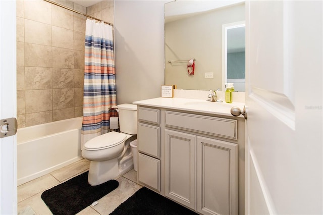 bathroom featuring tile patterned flooring, shower / tub combo with curtain, toilet, and vanity