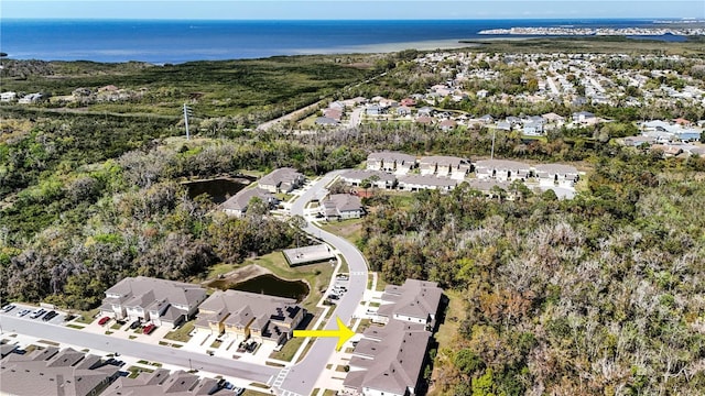 aerial view featuring a residential view and a water view