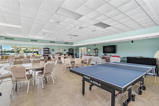 rec room with visible vents and a drop ceiling