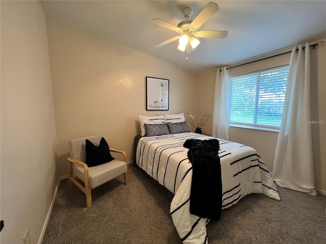 bedroom featuring lofted ceiling, carpet flooring, ceiling fan, and baseboards