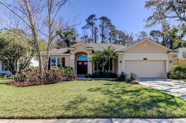 ranch-style home with driveway, a front lawn, an attached garage, and stucco siding