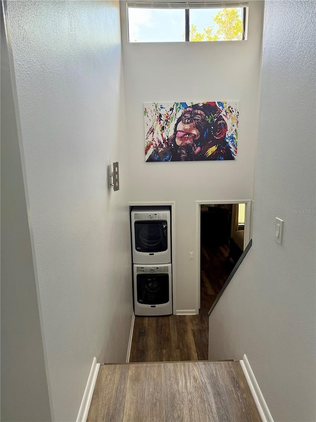 interior space featuring plenty of natural light, wood finished floors, and baseboards