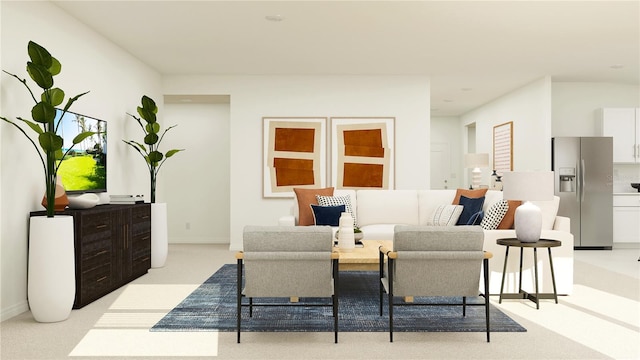 living area with baseboards and light colored carpet