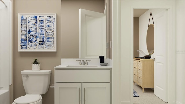 bathroom with toilet and vanity