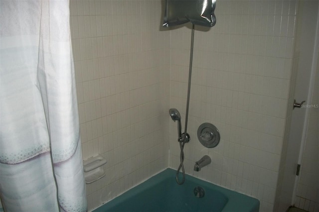 bathroom with shower / bathing tub combination