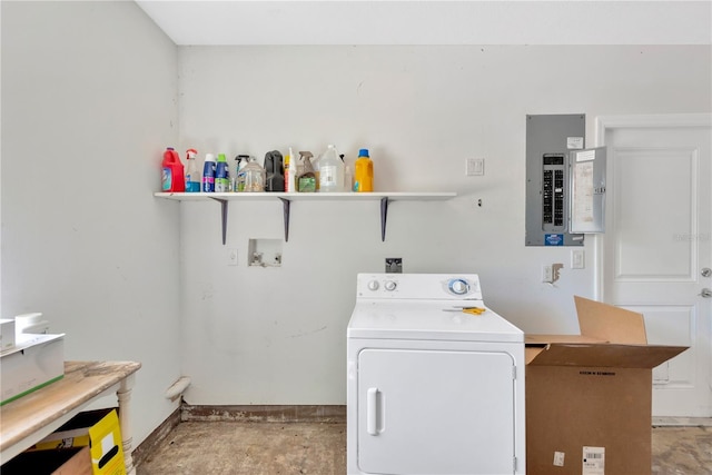 washroom featuring electric panel, washer / dryer, and laundry area