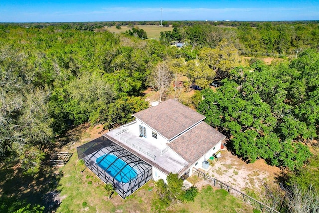 aerial view with a wooded view