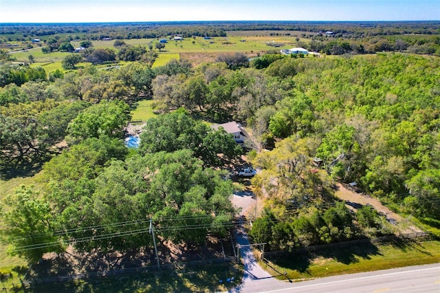 aerial view with a wooded view