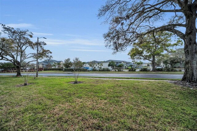 view of yard featuring a residential view