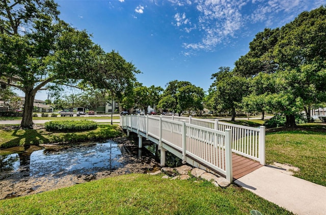 view of dock featuring a yard