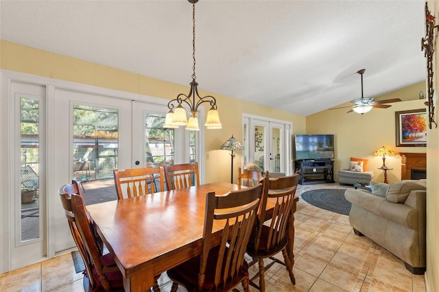 dining space featuring lofted ceiling, french doors, and a wealth of natural light