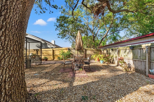 view of yard with a patio area and a fenced backyard