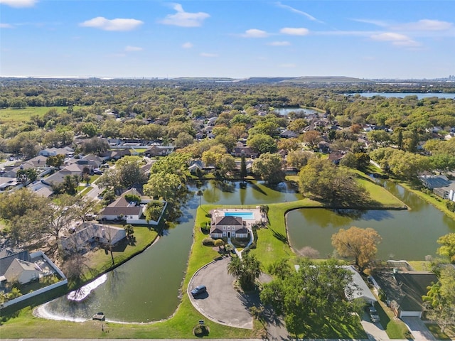 aerial view featuring a residential view and a water view