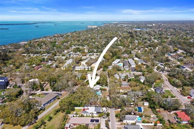 bird's eye view with a water view and a residential view