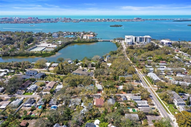 birds eye view of property featuring a water view