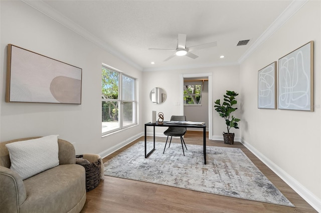 office featuring visible vents, baseboards, ornamental molding, and dark wood-style flooring