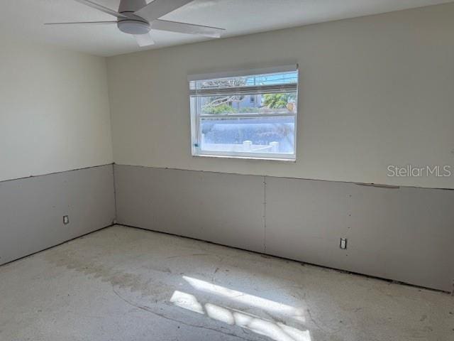 spare room featuring ceiling fan