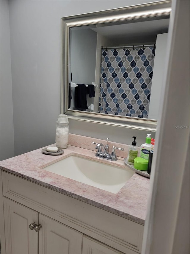 full bathroom with vanity