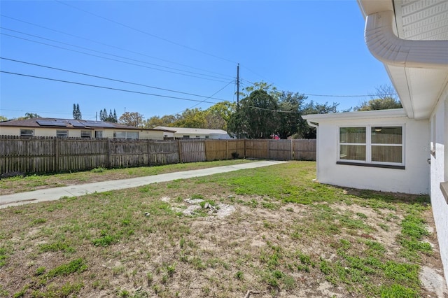 view of yard with a fenced backyard