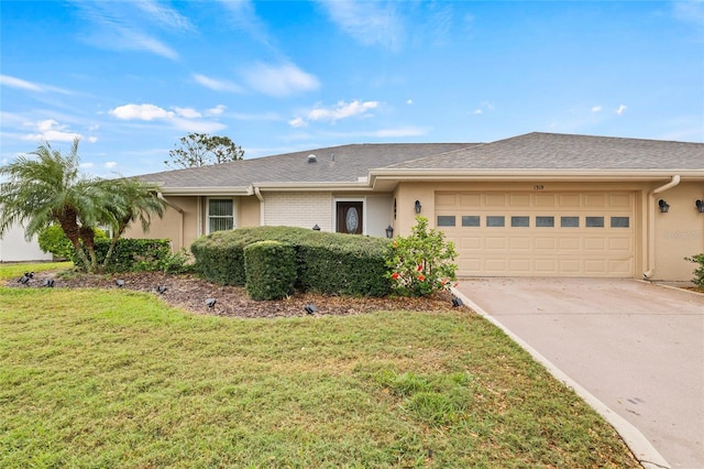 ranch-style house with a front lawn, concrete driveway, an attached garage, and stucco siding