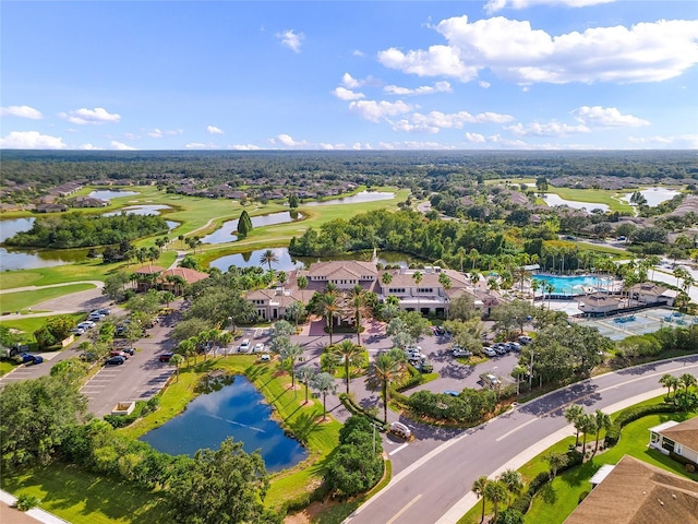 birds eye view of property featuring a water view and view of golf course