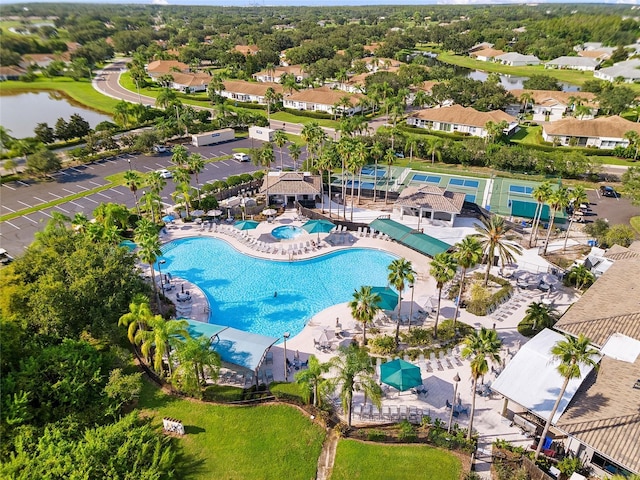 aerial view featuring a water view and a residential view