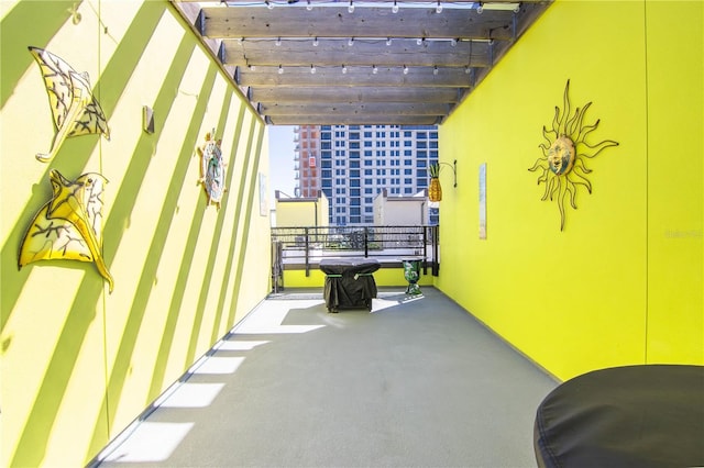 view of patio / terrace featuring a balcony and a pergola