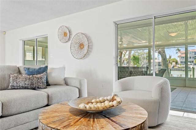 tiled living area with plenty of natural light