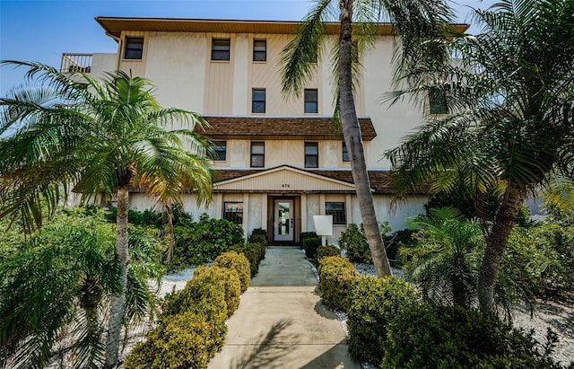 view of front of house featuring stucco siding