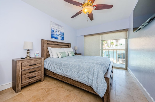 bedroom with a ceiling fan, access to outside, and baseboards