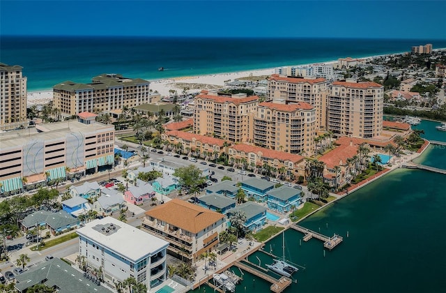 drone / aerial view featuring a water view and a city view