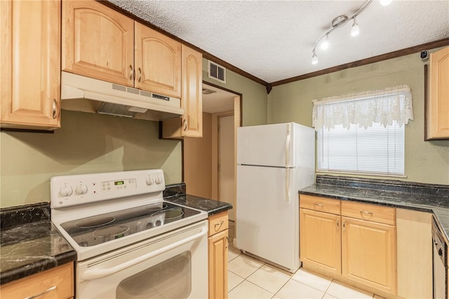 kitchen with white appliances, dark countertops, under cabinet range hood, and a textured ceiling