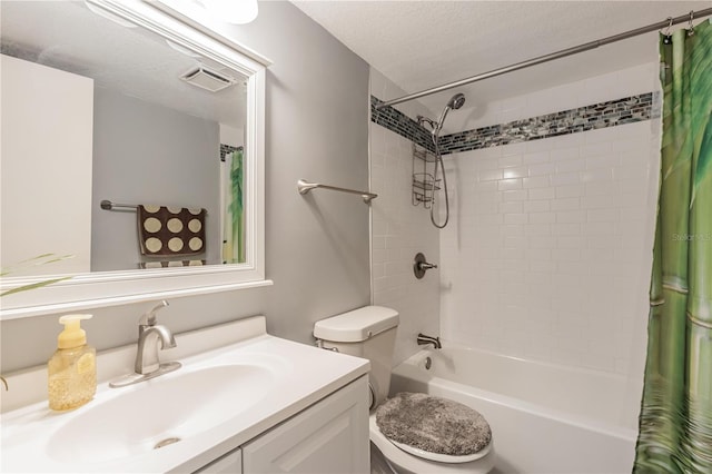 full bathroom featuring visible vents, toilet, vanity, a textured ceiling, and shower / bathtub combination with curtain