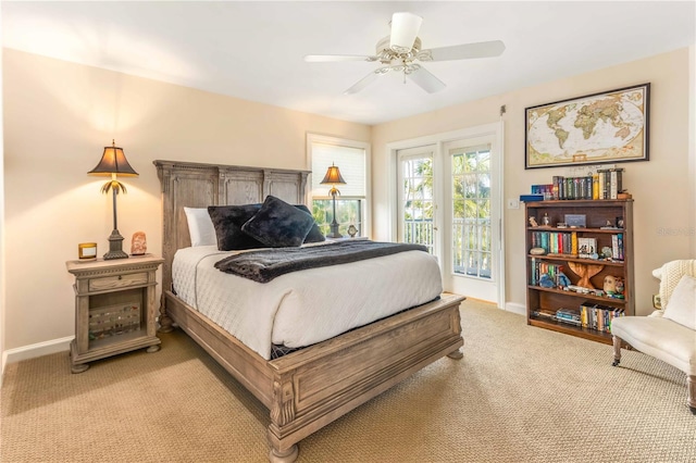 bedroom with baseboards, light carpet, ceiling fan, and access to outside