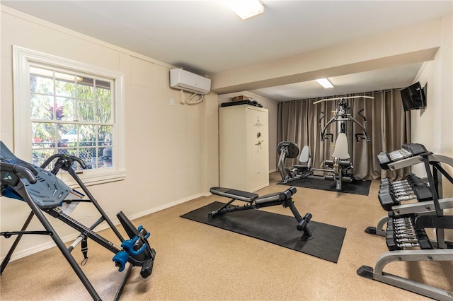 exercise area featuring an AC wall unit and carpet flooring