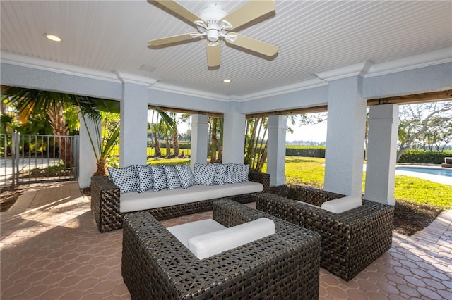 view of patio featuring a fenced in pool, an outdoor hangout area, ceiling fan, and fence