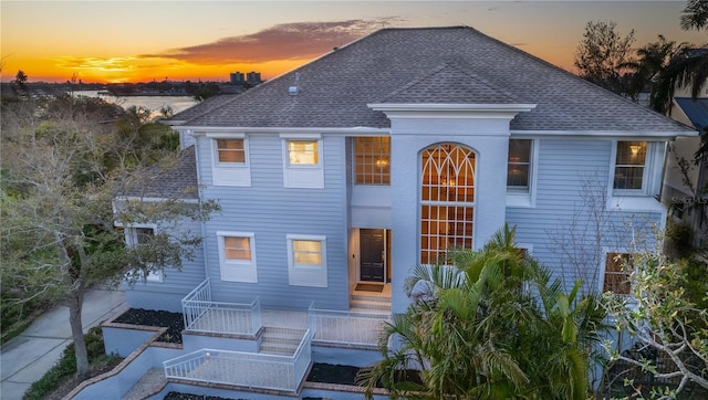12808 Harborwood Dr, Largo, FL 33774 - view of front of property featuring roof with shingles