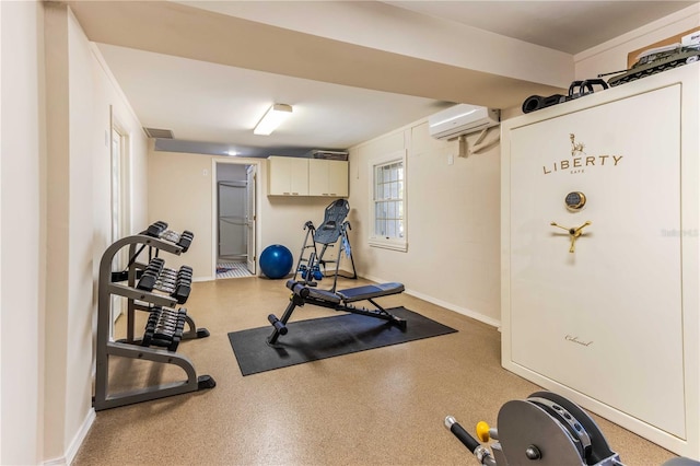 12808 Harborwood Dr, Largo, FL 33774 - workout room with a wall unit AC, baseboards, and visible vents