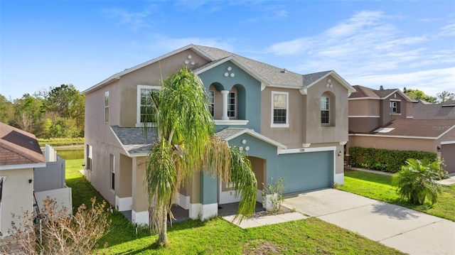 view of front of property featuring a front lawn, concrete driveway, roof with shingles, stucco siding, and a garage