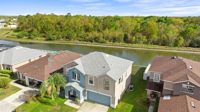 aerial view featuring a water view and a residential view