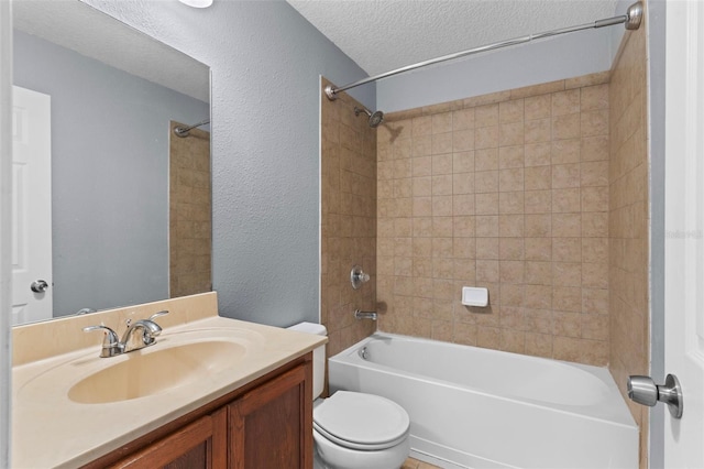 full bath featuring toilet, a textured ceiling, tub / shower combination, vanity, and a textured wall