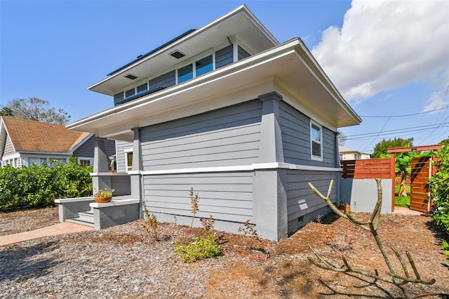 view of property exterior featuring crawl space