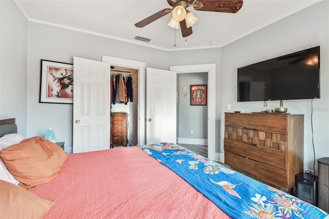 bedroom featuring ceiling fan, baseboards, visible vents, and ornamental molding