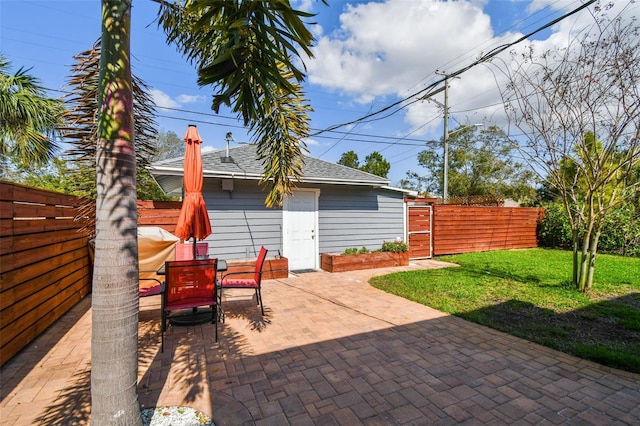 view of patio featuring fence private yard and outdoor dining space