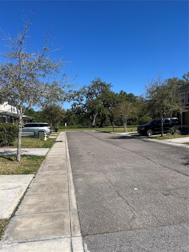 view of road featuring sidewalks