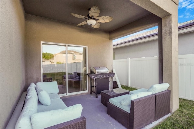 view of patio / terrace with area for grilling, an outdoor hangout area, a ceiling fan, and fence