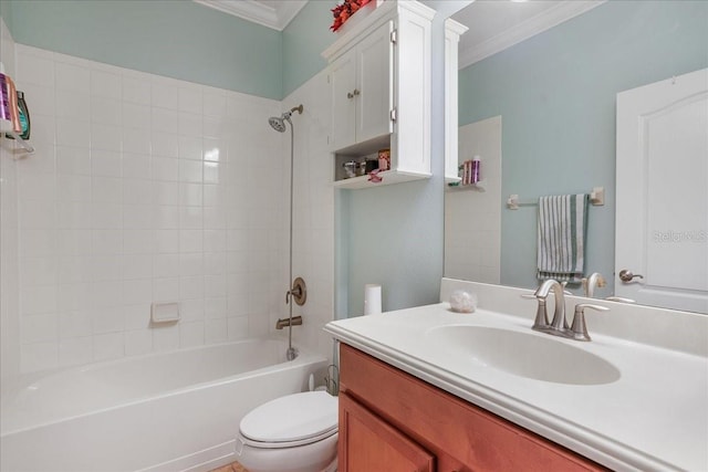 bathroom featuring vanity, toilet, washtub / shower combination, and ornamental molding