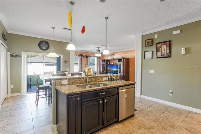 kitchen with visible vents, a kitchen island with sink, ornamental molding, a sink, and dishwasher
