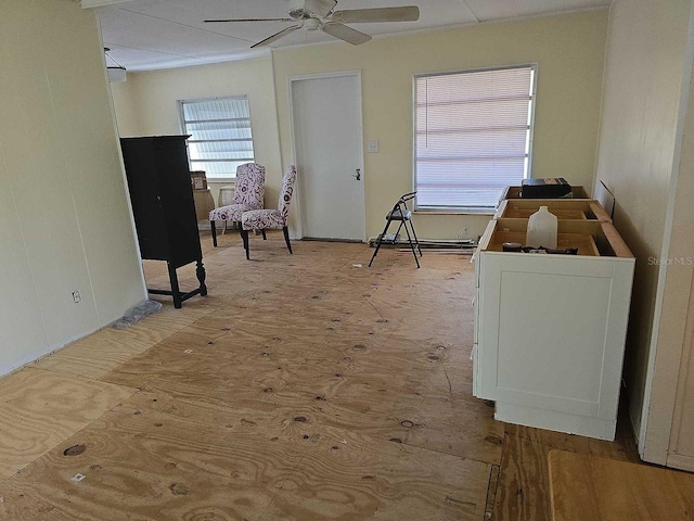 interior space featuring a ceiling fan