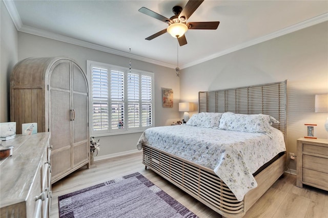 bedroom with light wood-type flooring, baseboards, ornamental molding, and a ceiling fan